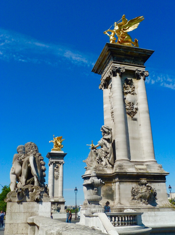 The imposing Pont Alexandre bridge over the Seine in Paris France