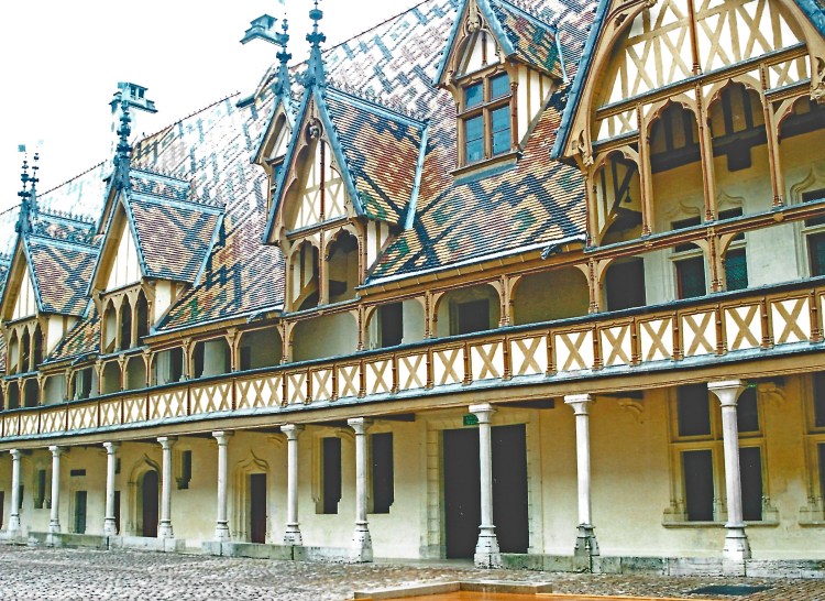 the hospice de Beaune is the scene of the yearly wine auction of Burgundy wines