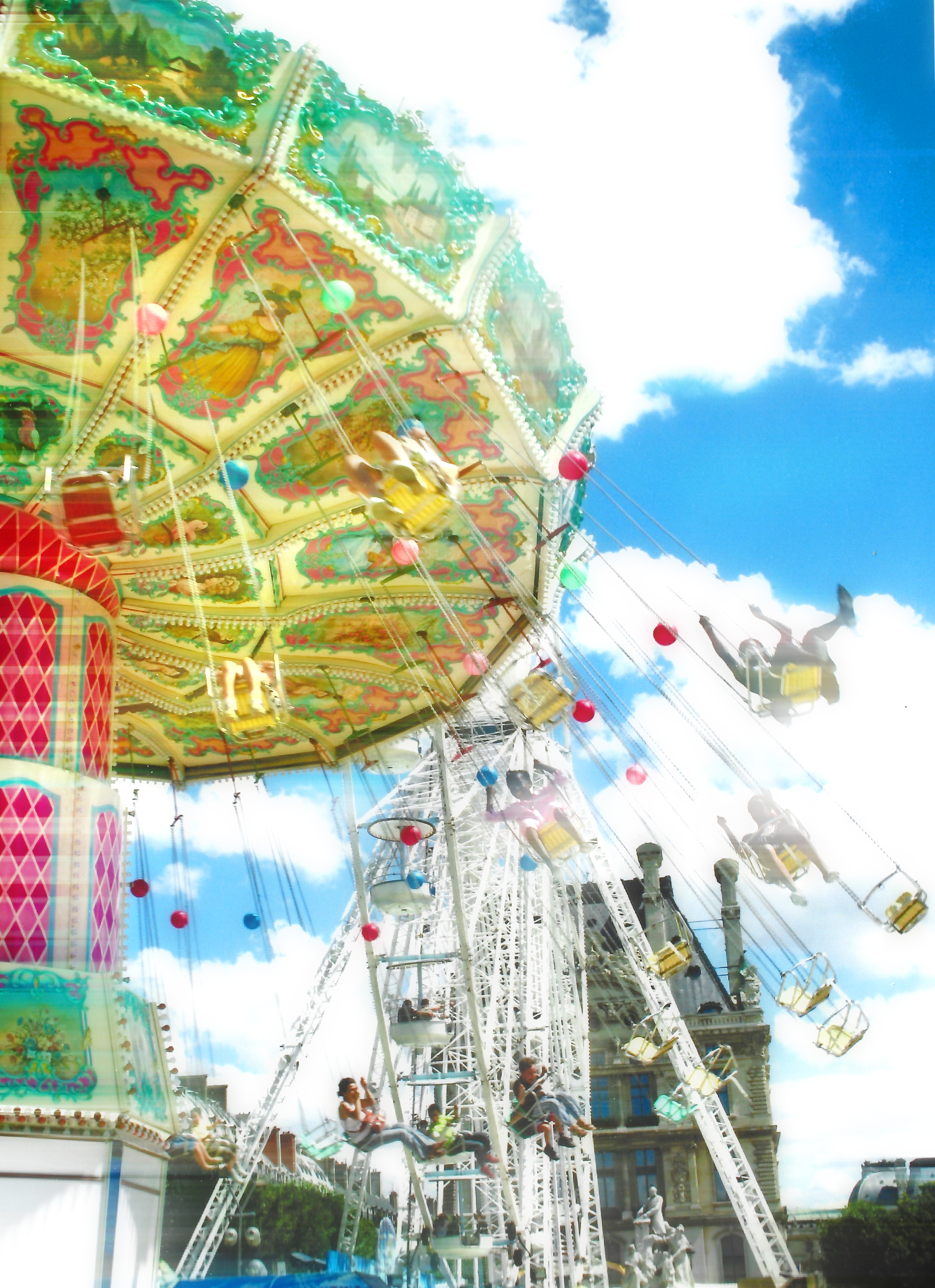 Alt="Photo of carousel in Tuileries Gardens Paris"