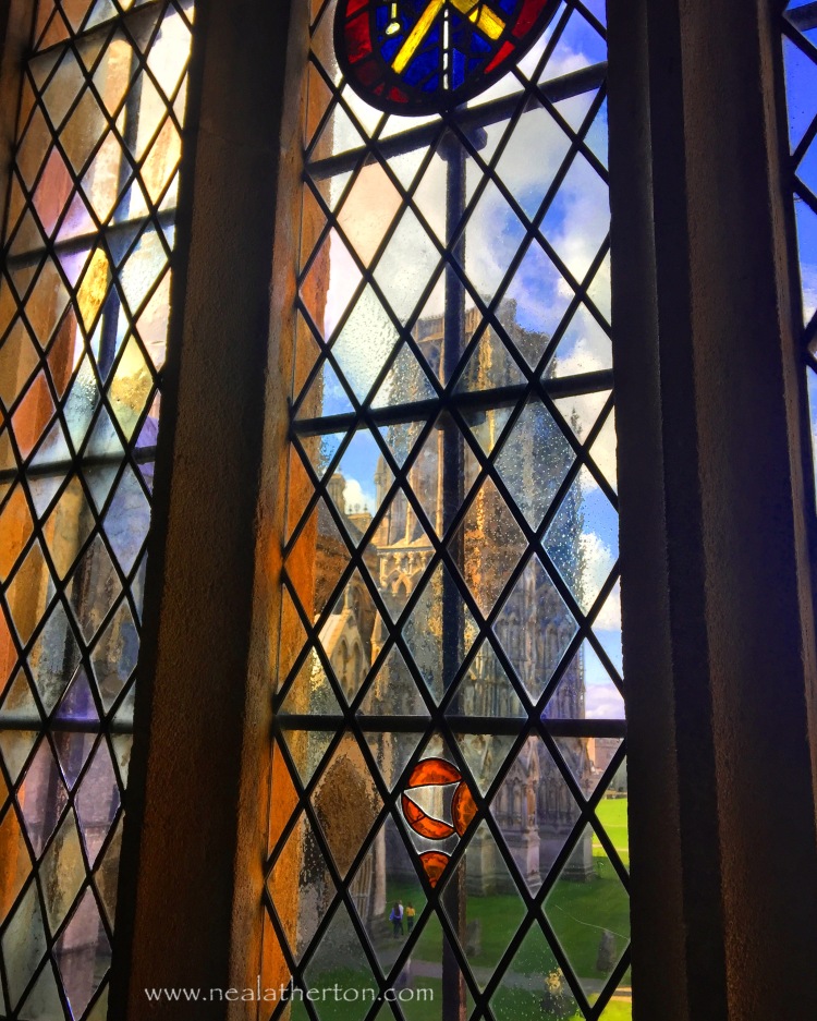 Alt="Photo of stain glass window Wells cathedral"