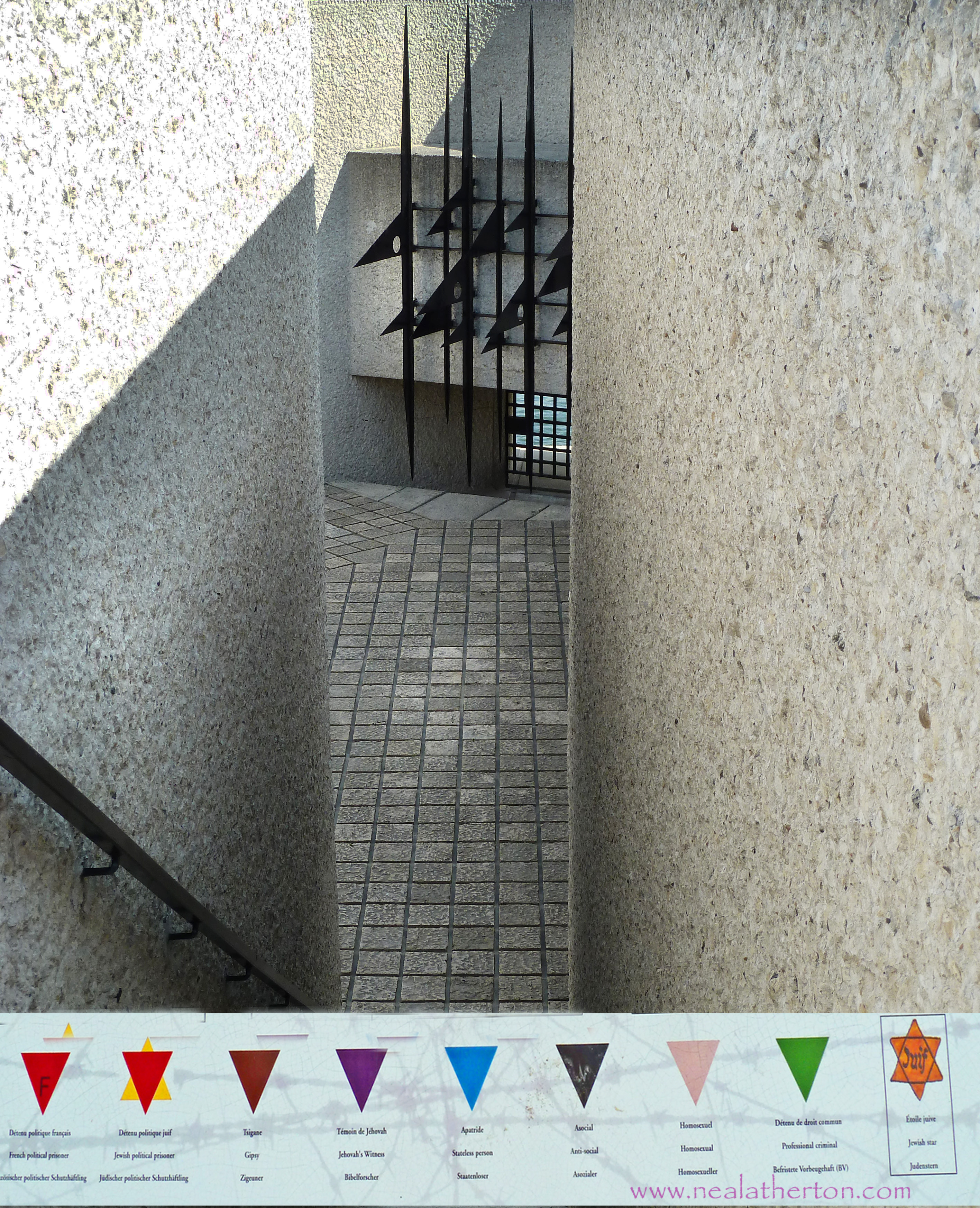 Alt="Going into the bleak entrance to the Memorial to the Martyrs of the Deportation Paris"