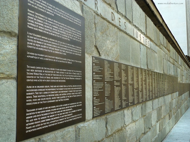Alt="Looking along the wall of the Righteous at the Shoah Memorial in Paris France"