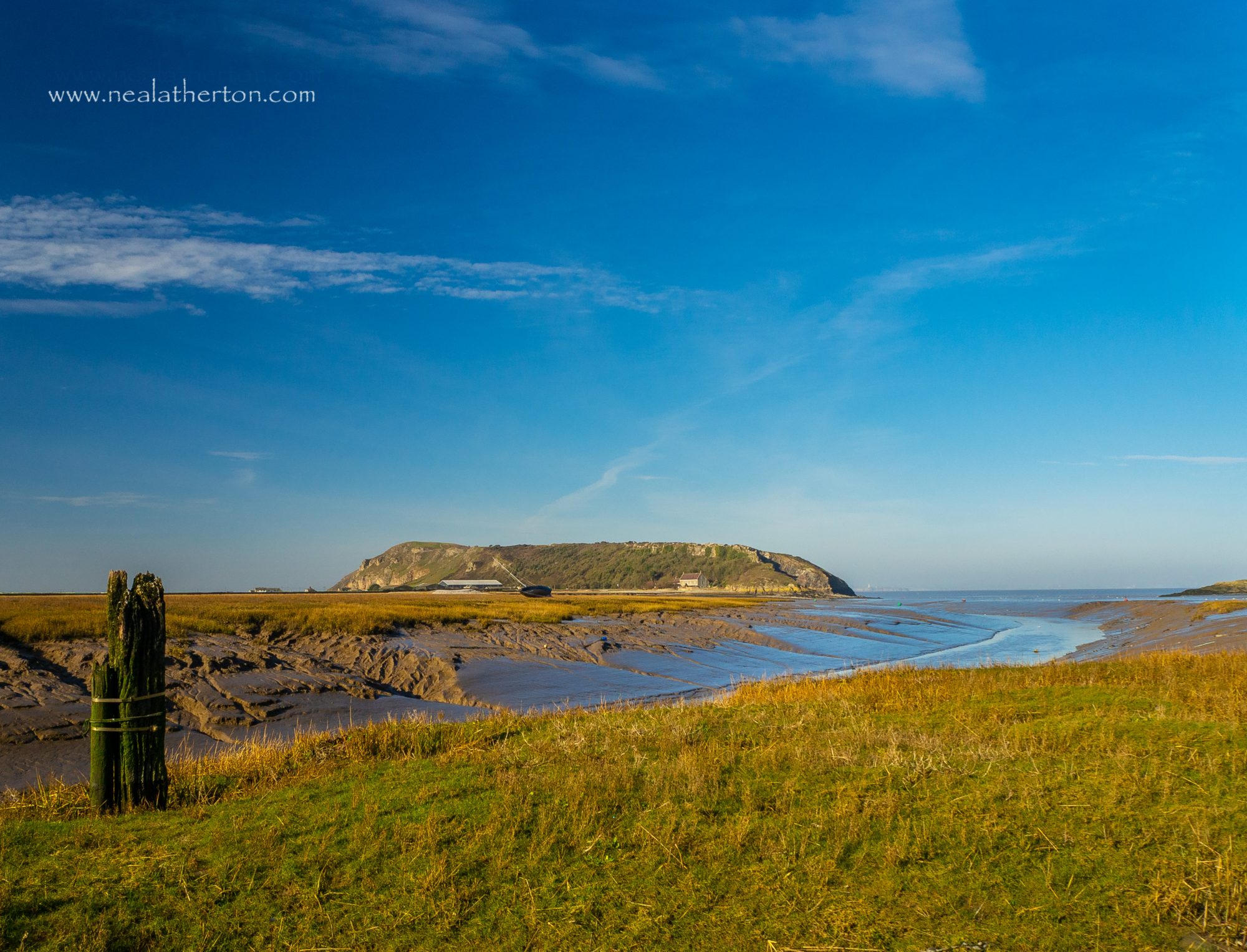Alt="Brean Down in the distance beyond Uphill Estuary"