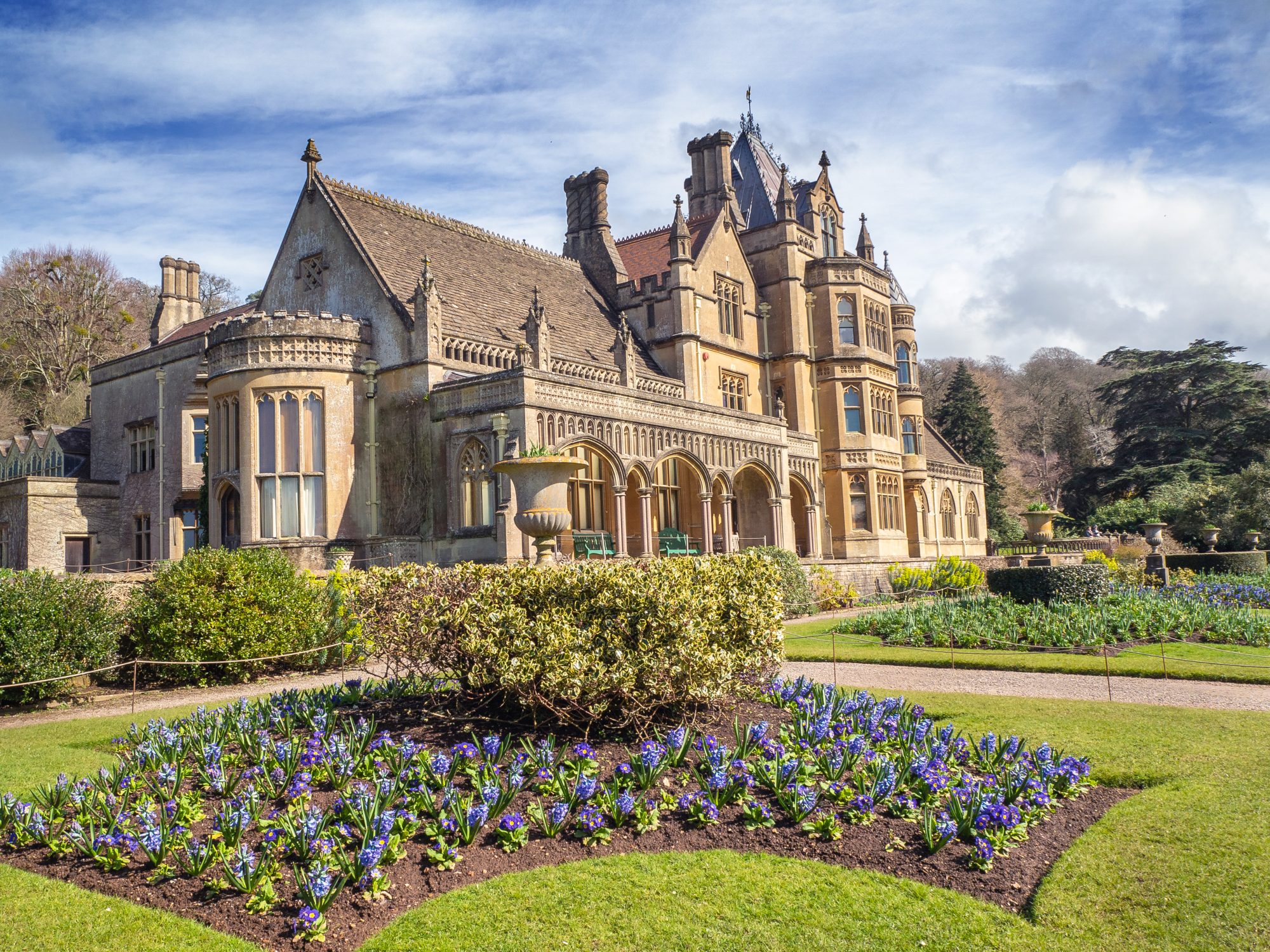 The house at Tyntesfield with spring garden border
