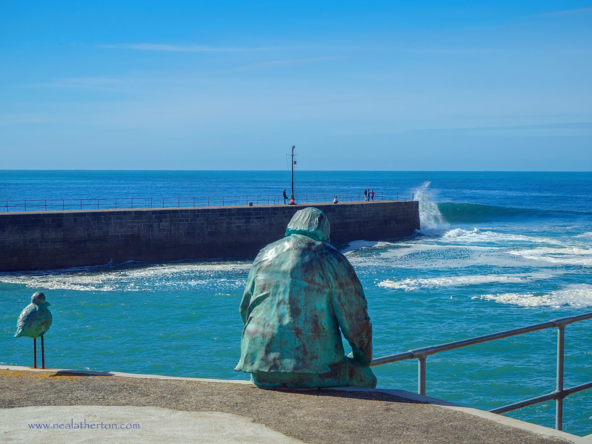 Porthleven has a statue sculpture at the entrance to the harbour
