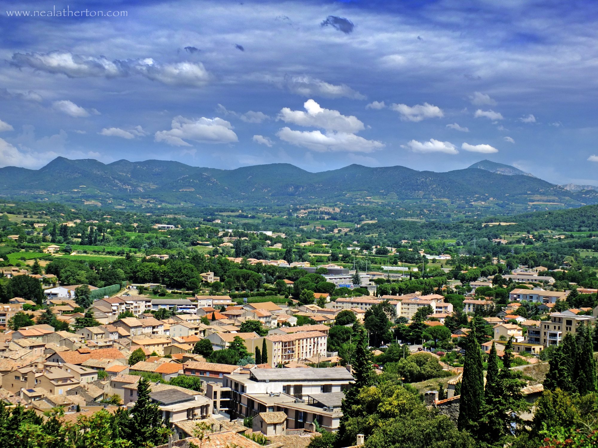 Mountains of Provence and dramatic sky from the old walls of the Roman town of Vaison