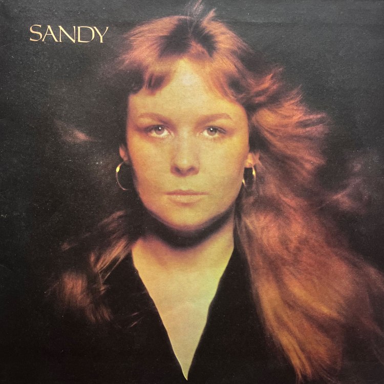 The front cover of the album sleeve for Sandy Denny album in vinyl entitled Sandy shoewing the beautiful portrait of Sandy Denny by the photographer David Bailey