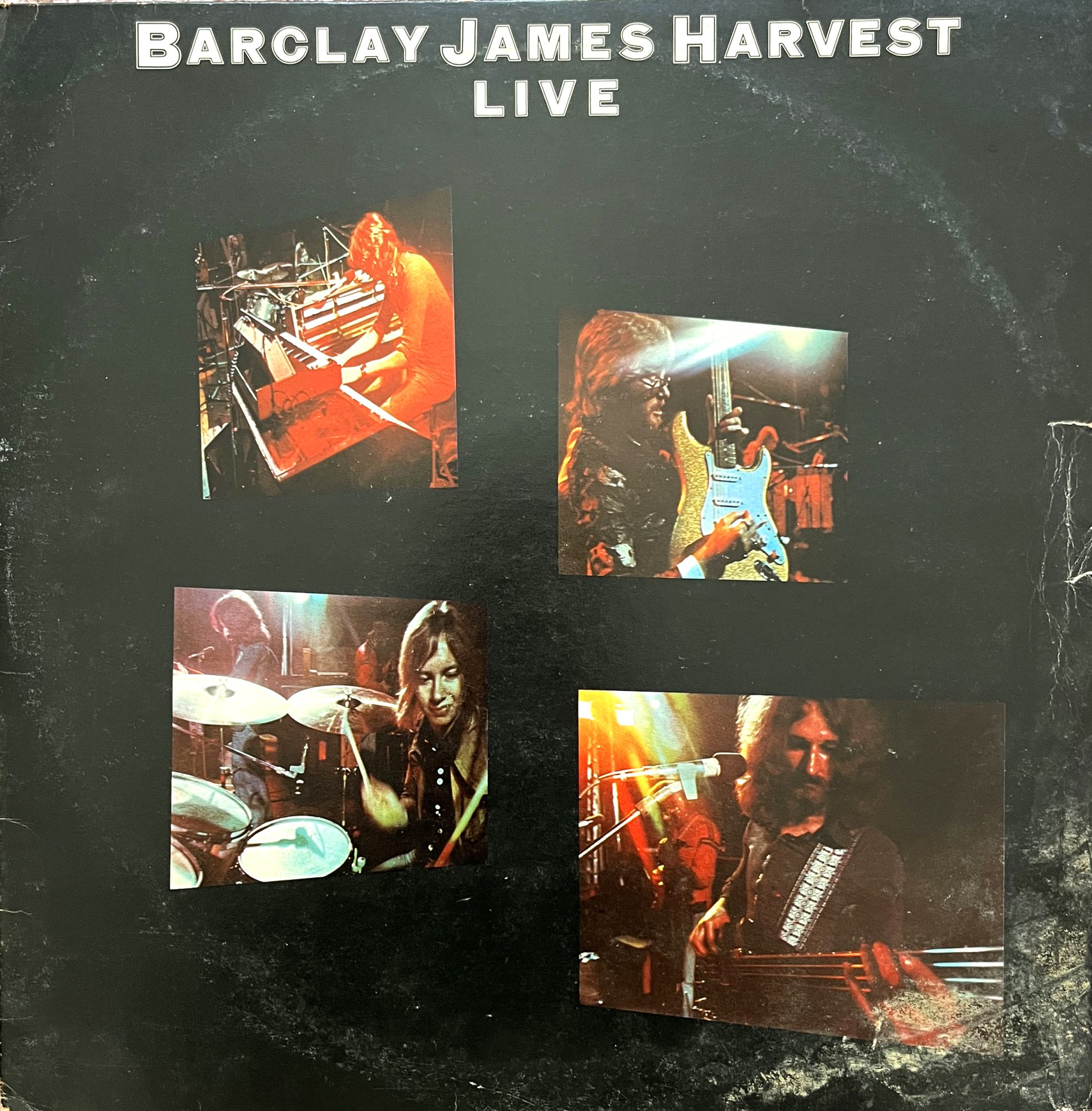 The four members of Barclay James Harvest on the cover of the live album from 1974