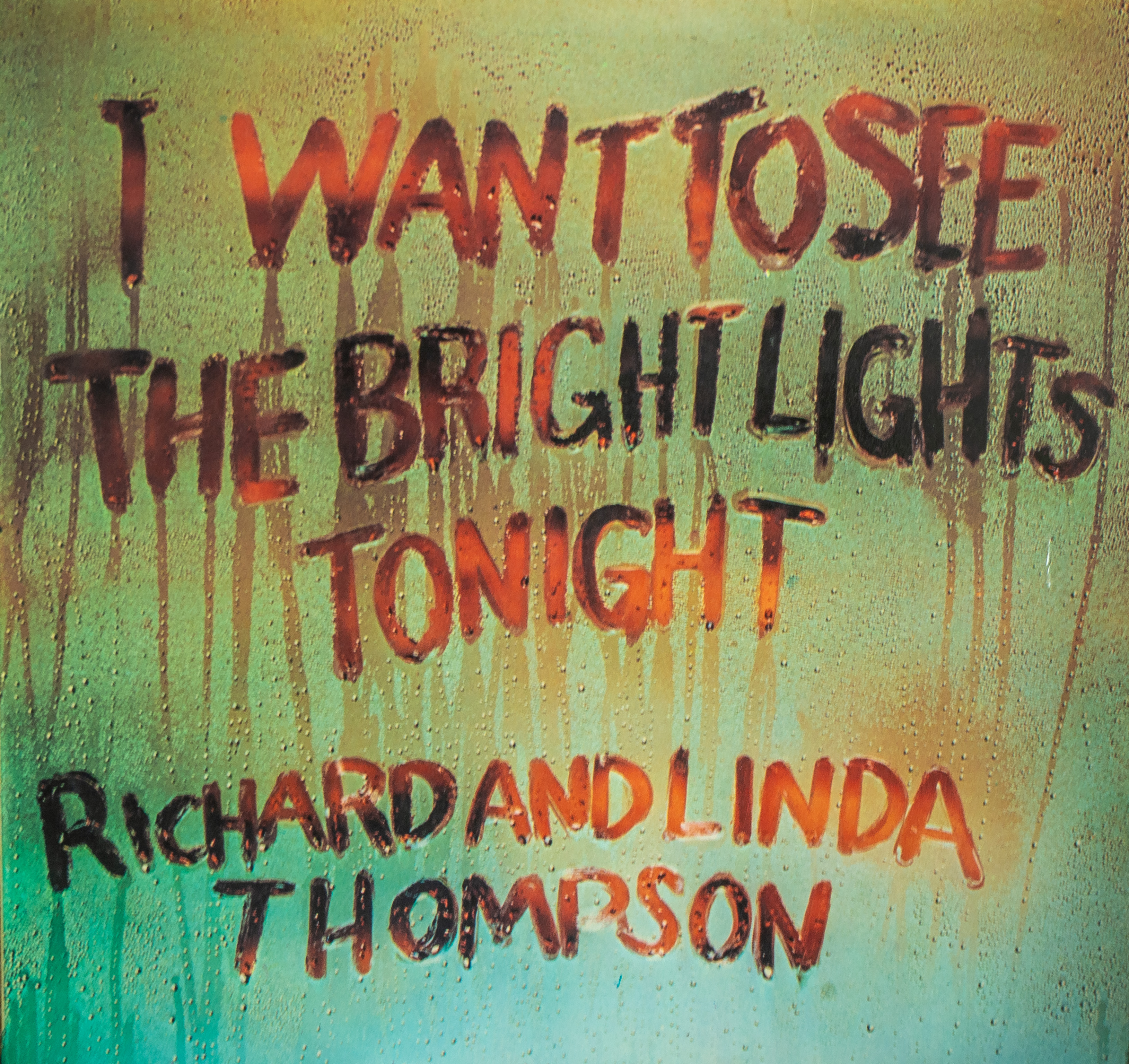 The title of I want to see the bright lights tonight is drawn on a moisture stained glass shown the artists Richard and Linda Thompson