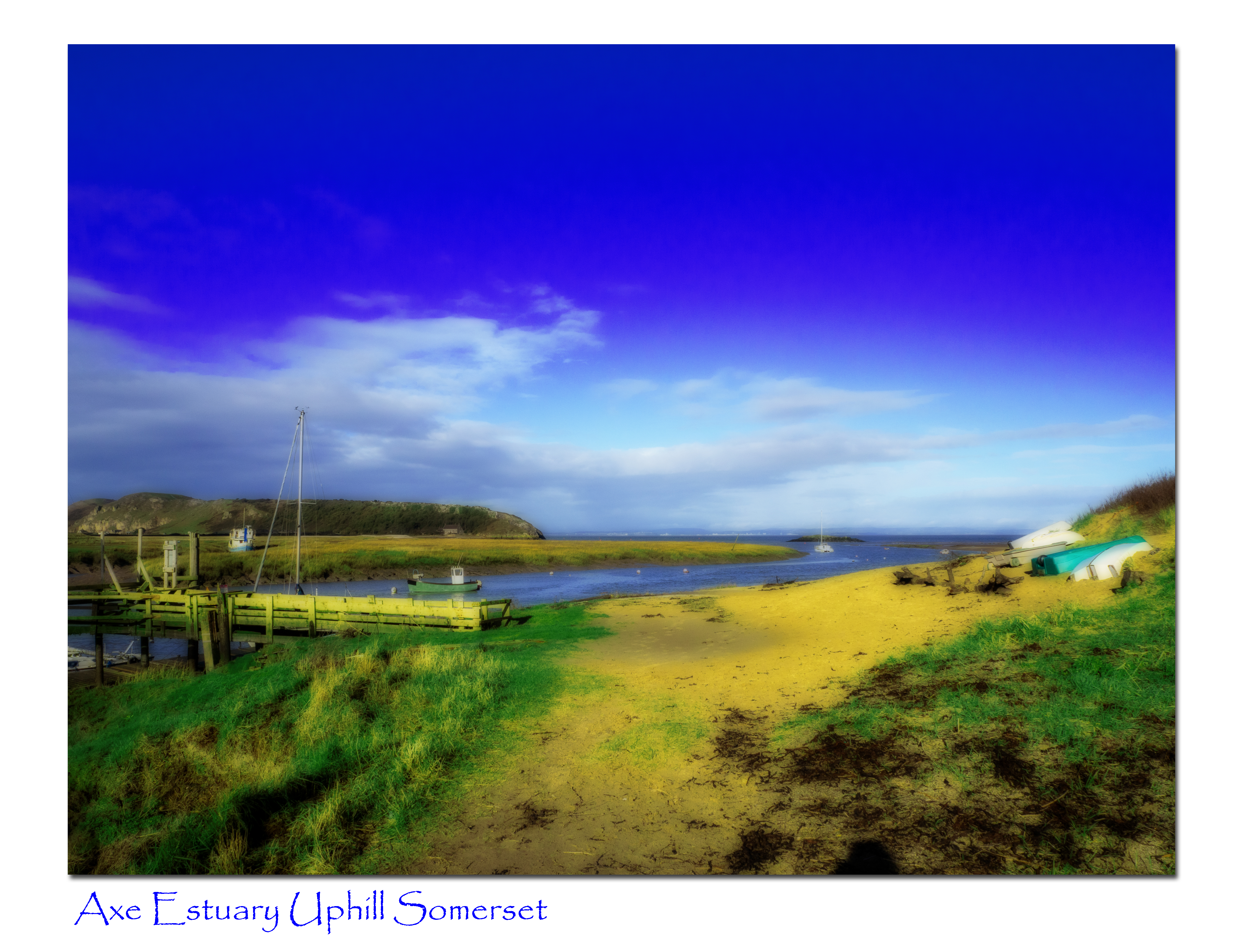 Gaussian blur on a scene at Uphill somerset nealr the wooden jetty with Brean down and a blue summer sky