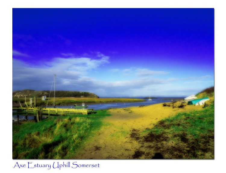 Gaussian blur on a scene at Uphill somerset nealr the wooden jetty with Brean down and a blue summer sky