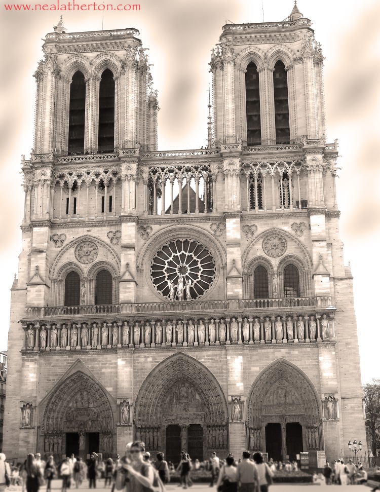 people crowd in front of Notre Dame cathedral Paris in black and white